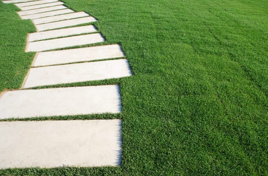 concept of success, challenge and destination (stones on a lawn park regarding phases and goals)