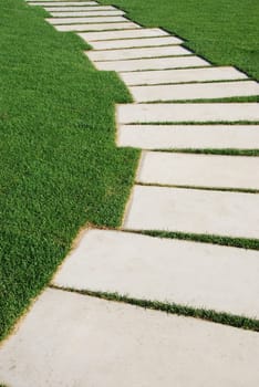 concept of success, challenge and destination (stones on a lawn park regarding phases and goals)