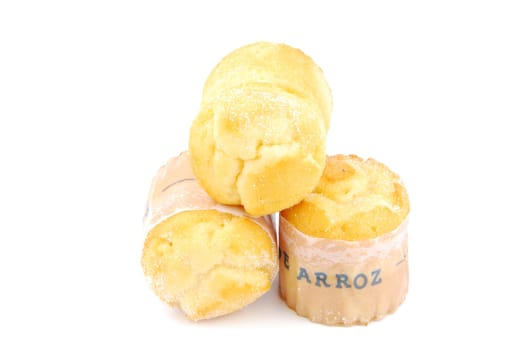 bunch of delicious "bolo de arroz"" or rice muffins, typical pasty from Portugal (isolated on white background)"