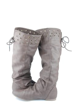 women brown leather boots isolated on white background