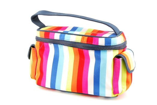 closed colorful toiletry bag isolated on white background