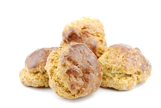 bunch of traditional portuguese small pastries called saints cakes (isolated on white background)