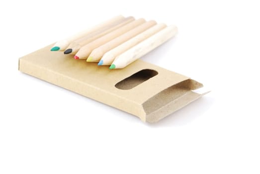 colour pencils and pencil case isolated on white background