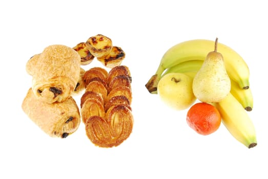 health/unhealthy concept with an assortment of fruits and baked goods (isolated on white background)