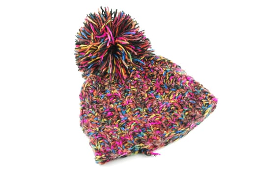 colorful winter knit hat isolated on white background