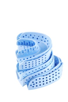 different sizes of acrylic trays for teeth impressions