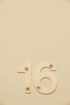 white flat number hanging on the door
