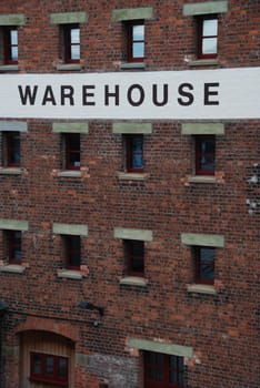 typical british architecture of a antique warehouse building in Gloucester docks