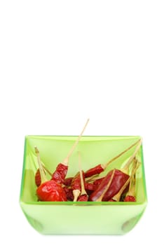 red chili peppers on a cup isolated on white background
