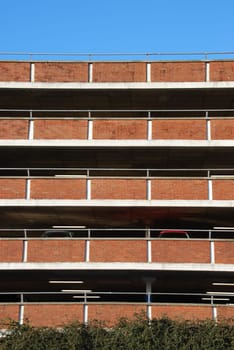 empty parking facility on a tall brick building