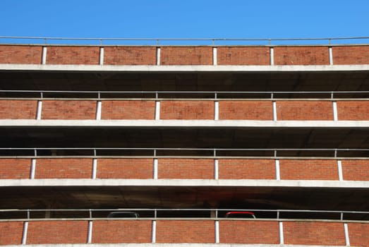 empty parking facility on a tall brick building