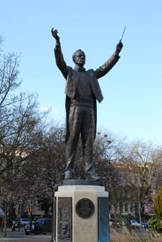 the statue of Gustav Theodore Holst at Memorial Fountain in Cheltenham Imperial gardens, England