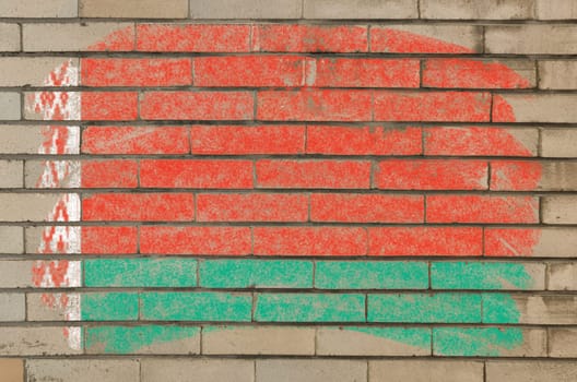 Chalky belarussian flag painted with color chalk on grunge old brick wall