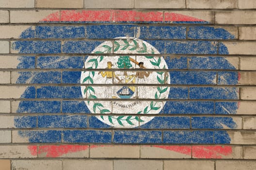 Chalky belize flag painted with color chalk on grunge old brick wall