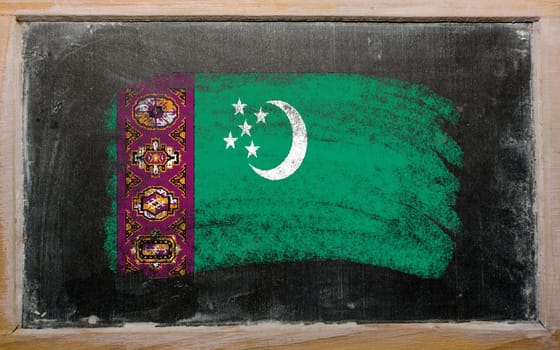 Chalky turkmenistan flag painted with color chalk on old blackboard