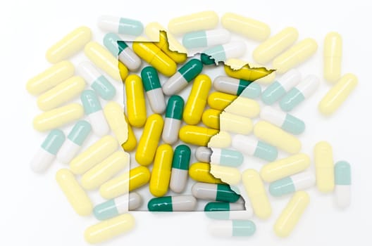 Outlined minnesota with transparent background of capsules