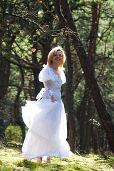 Woman in white dress Woman dancing in Forest