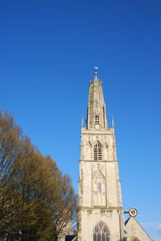 St Nicholas church in Gloucester, England (blue sky background)