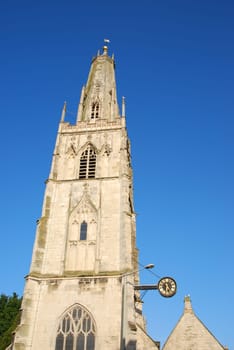 St Nicholas church in Gloucester, England (blue sky background)