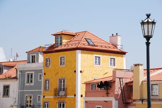 beautiful and traditional view of antique buildings and lamp post in Lisbon, Portugal