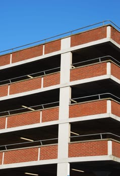 empty parking facility on a tall brick building