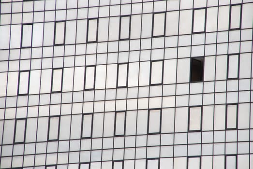 close-up on a modern office building facade with glass pattern