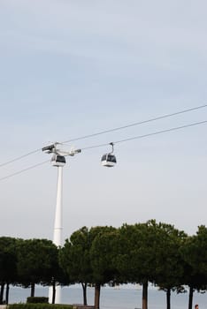 two modern cablecars in Nations Park in Lisbon, Portugal