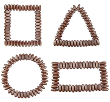beautiful collection of 4 geometric shapes (square, triangle, circle, rectangle) with chocolate candies (isolated on white background)