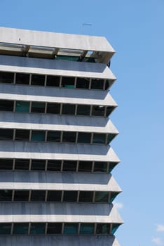 modern office building against blue sky background