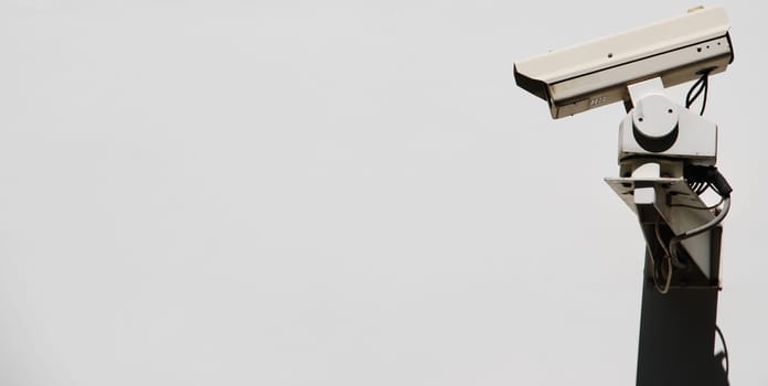 video surveillance camera on a wall
