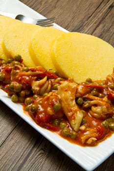 polenta with cuttlefish and peas