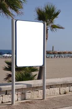 empty billboard and sidewalk at the beach