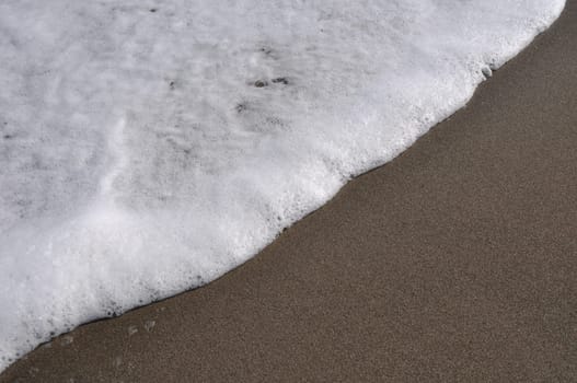 gorgeous beach sand and sea foam (copy-space available)