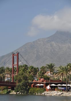 beautiful Puerto Banus bridge (reminding Golden Gate Bridge in San Francisco), Spain