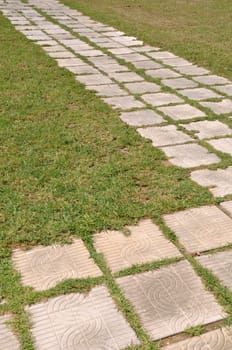 concept of success, challenge and destination (stones on a lawn park regarding phases and goals)