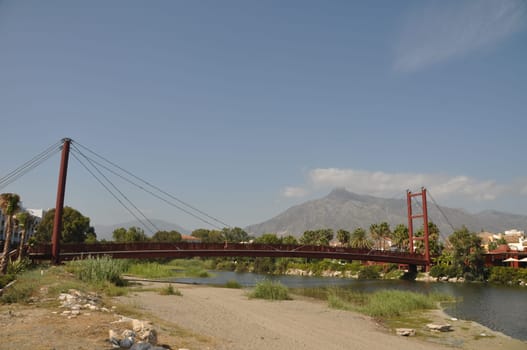 beautiful Puerto Banus bridge (reminding Golden Gate Bridge in San Francisco), Spain