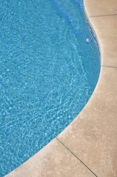 blue and vibrant swimming pool side