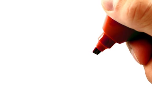 Hand with red pencil