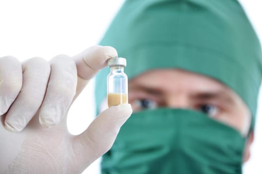 Doctor with drug in hand isolated on white background