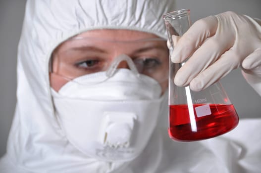 Scientist with chemicals in a laboratory