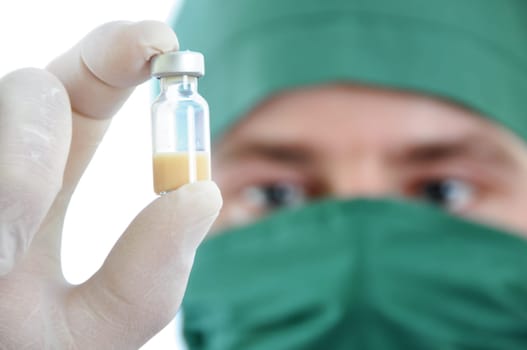 Doctor with drug in hand isolated on white background