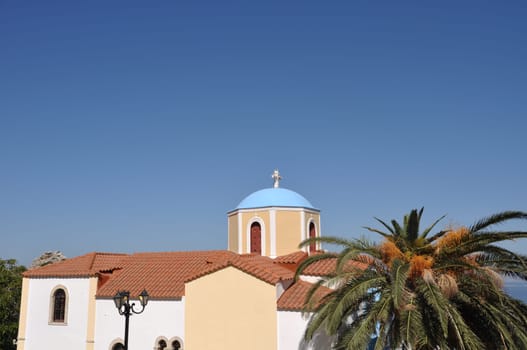 typical greek church in Zia village (Kos island), Greece (gorgeous blue sky)
