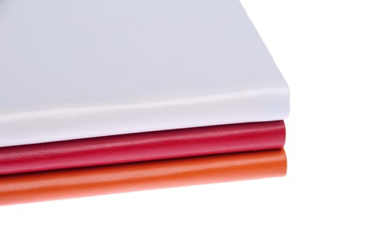 pile of colored books (isolated on white background)