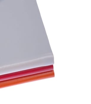 pile of colored books (isolated on white background)