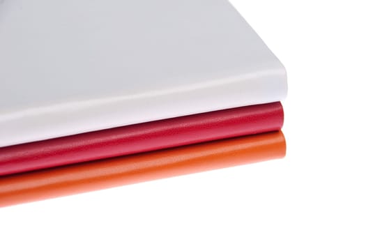 pile of colored books (isolated on white background)