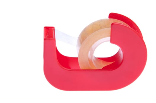 red plastic tape dispenser isolated on white background