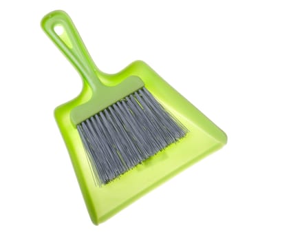 green dustpan and brush isolated on white background