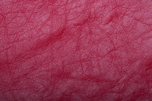 gorgeous red leather scrap background or texture