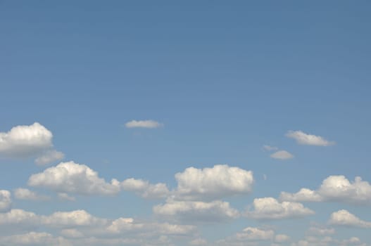 gorgeous white clouds in the blue sky (copy-space available at the top)