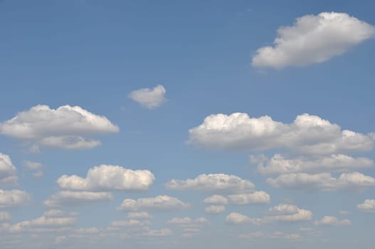 gorgeous white clouds in the blue sky (copy-space available at the top)